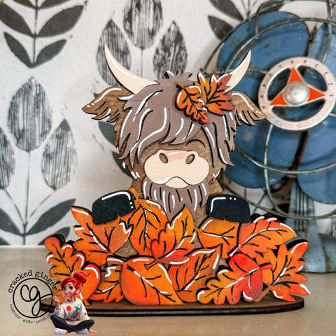 Fall highland cow in leaves shelf sitter