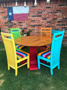 Refurbished solid oak dining table and serape chairs